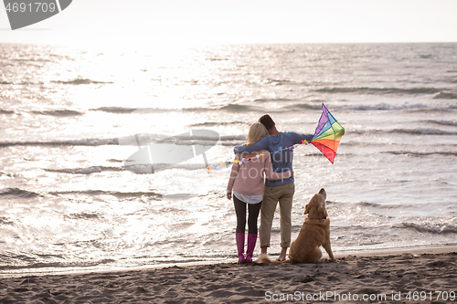 Image of happy couple enjoying time together at beach