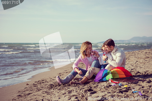 Image of family enjoying vecation during autumn day