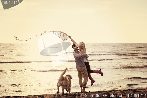 Image of happy couple enjoying time together at beach