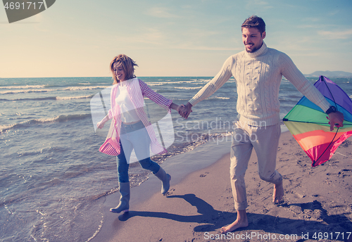 Image of Couple enjoying time together at beach