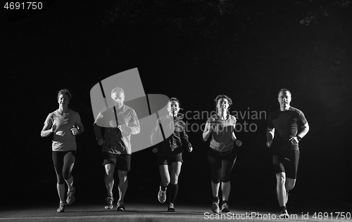 Image of runners team on the night training