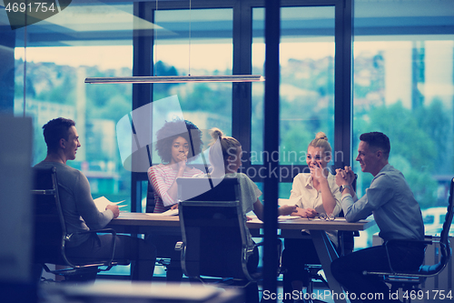 Image of Business Team At A Meeting at modern office building