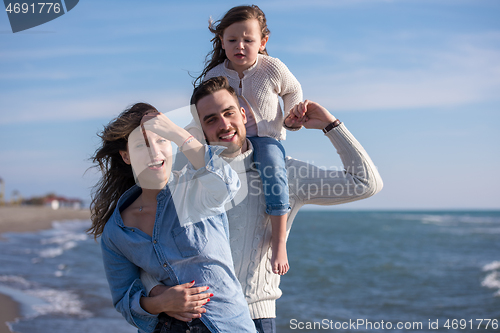 Image of Young family enjoying vecation during autumn