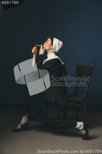 Image of Medieval young woman as a nun