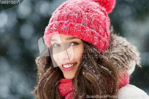 Image of smiling teenage girl outdoors in winter