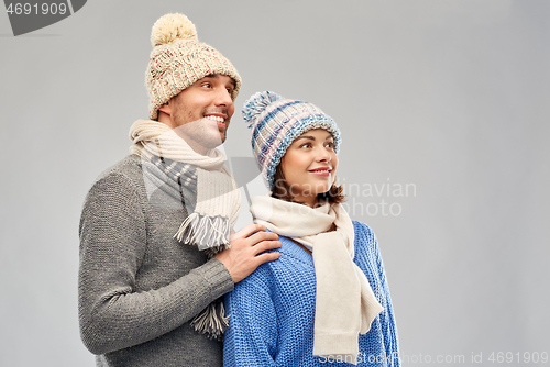 Image of happy couple in winter clothes