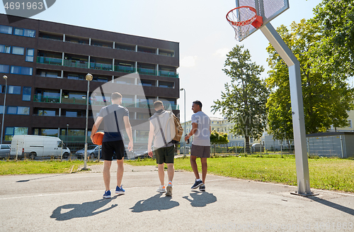 Image of group of male friends going to play basketball