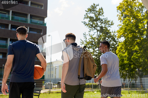 Image of group of male friends going to play basketball