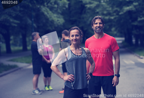 Image of portrait of a healthy jogging couple