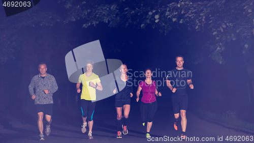 Image of runners team on the night training