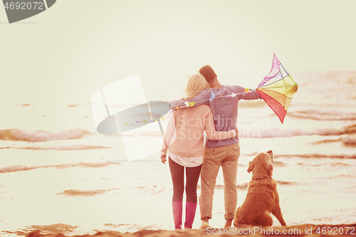 Image of happy couple enjoying time together at beach