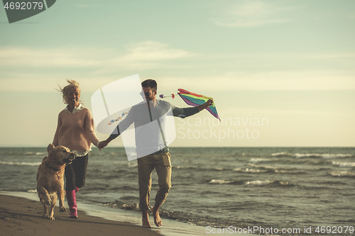 Image of happy couple enjoying time together at beach