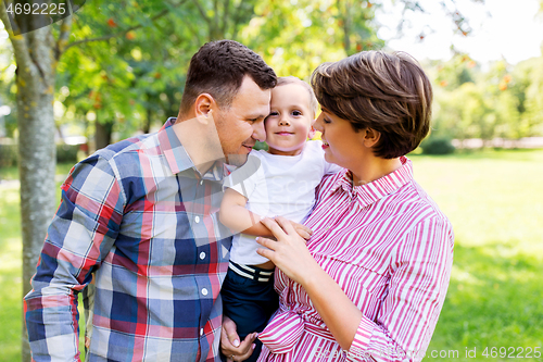 Image of happy family at summer park