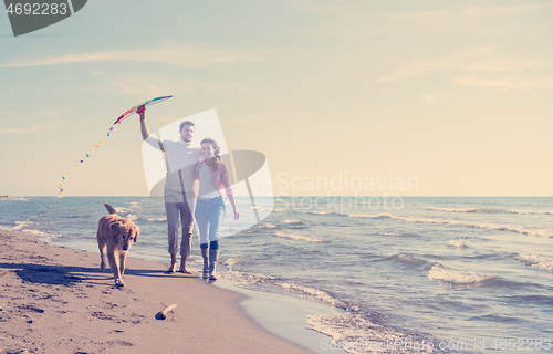 Image of happy couple enjoying time together at beach