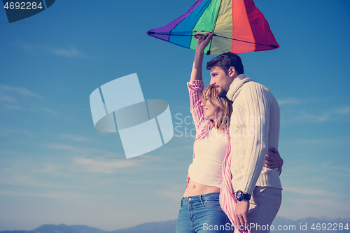 Image of Couple enjoying time together at beach