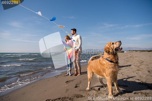 Image of happy couple enjoying time together at beach