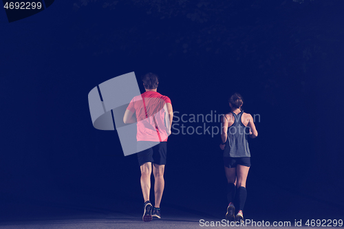 Image of runners team on the night training