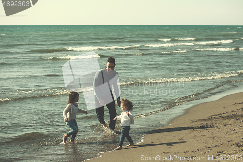 Image of Young family enjoying vecation during autumn