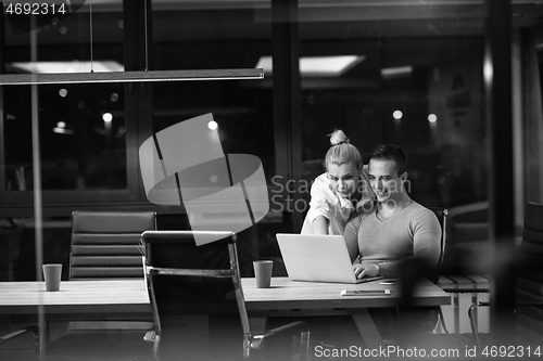 Image of young designers in the night office