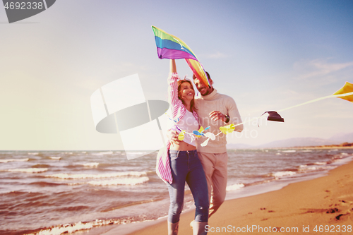 Image of Couple enjoying time together at beach