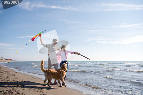 Image of happy couple enjoying time together at beach