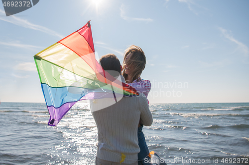 Image of Couple enjoying time together at beach