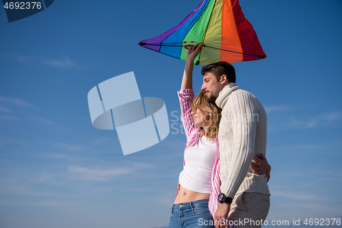 Image of Couple enjoying time together at beach