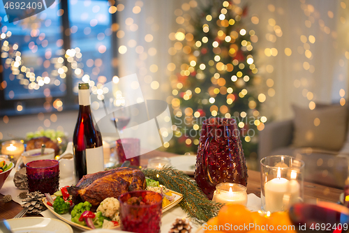 Image of food and drinks on christmas table at home