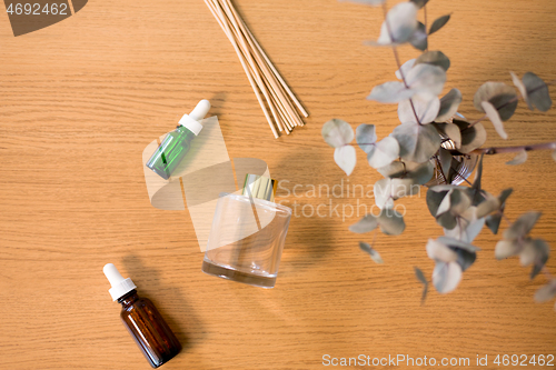 Image of aroma reed diffuser, essential oil and eucalyptus