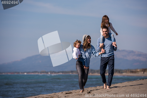 Image of Young family enjoying vecation during autumn