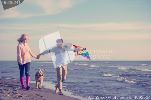 Image of happy couple enjoying time together at beach