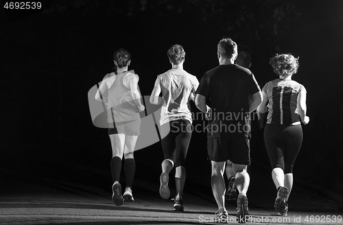 Image of runners team on the night training