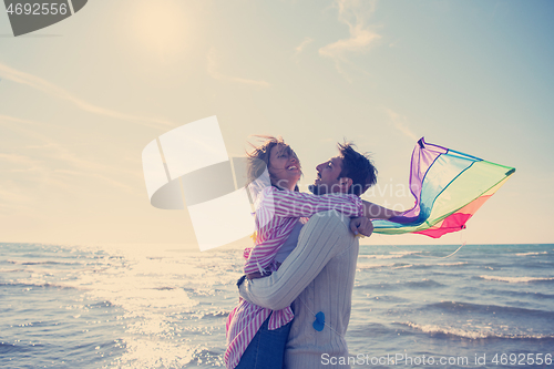 Image of Couple enjoying time together at beach