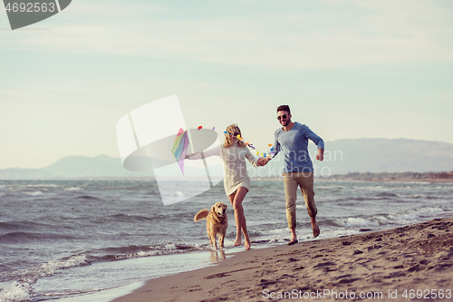 Image of happy couple enjoying time together at beach