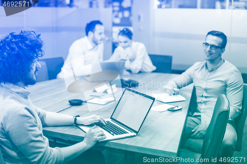 Image of Startup Business Team At A Meeting at modern office building