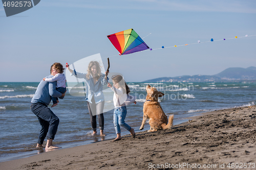 Image of happy young family enjoying vecation during autumn day