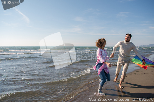 Image of Couple enjoying time together at beach