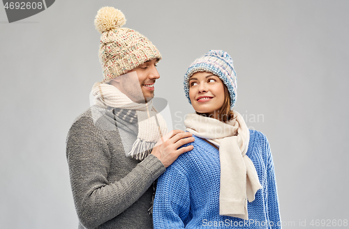 Image of happy couple in winter clothes