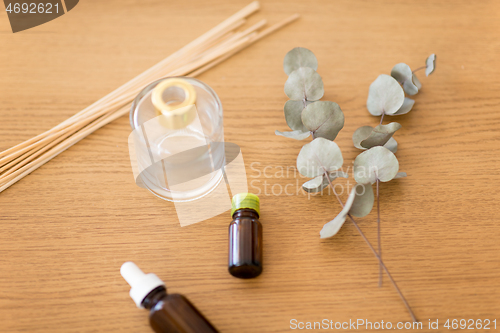 Image of aroma reed diffuser, essential oil and eucalyptus