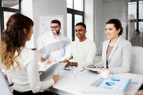 Image of recruiters having job interview with employee