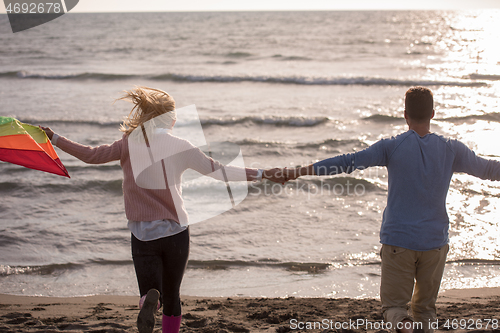 Image of Couple enjoying time together at beach