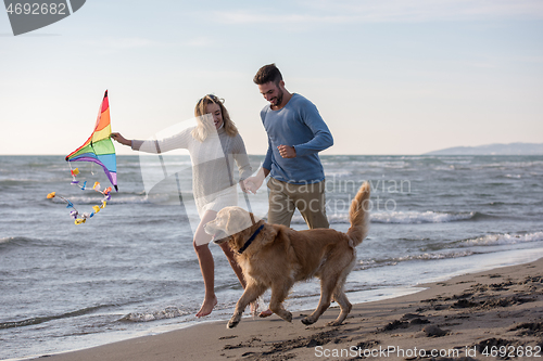 Image of happy couple enjoying time together at beach