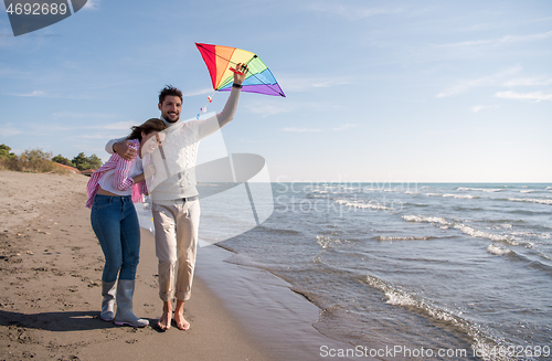 Image of Couple enjoying time together at beach