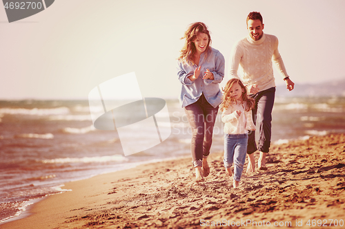 Image of Young family enjoying vecation during autumn