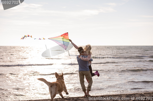 Image of happy couple enjoying time together at beach