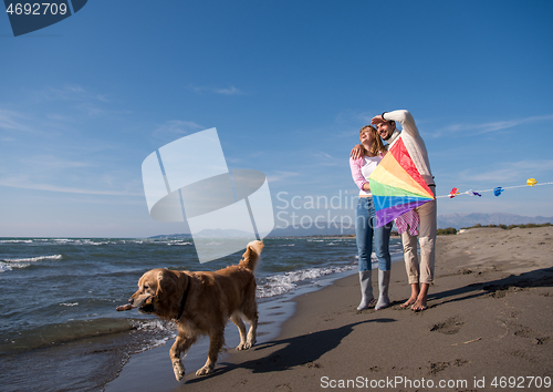 Image of happy couple enjoying time together at beach