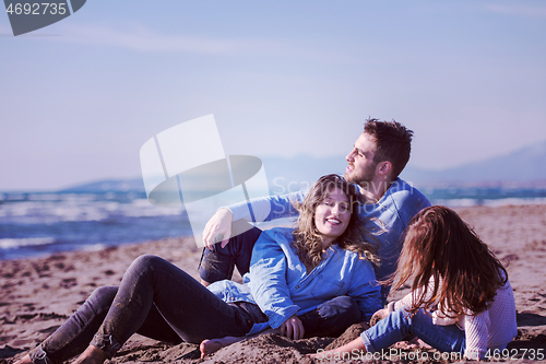 Image of Young family enjoying vecation during autumn