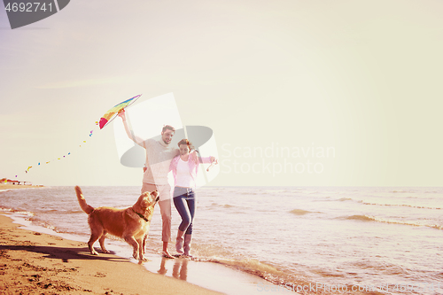 Image of happy couple enjoying time together at beach