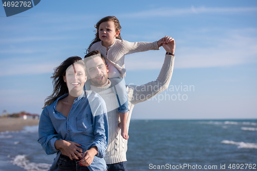 Image of Young family enjoying vecation during autumn