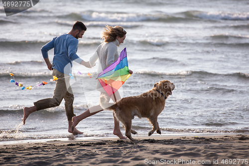 Image of happy couple enjoying time together at beach